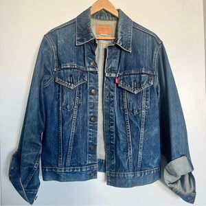 Vintage women’s Levi’s dark blue denim jean jacket, medium adult
